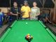 Turnamen Billiard di Alor Rebut Hadiah 5 Juta Rupiah Pemilik Margareth Billiar, Goliat Saiputa (tengah), foto bersama dua peserta lomba Billiard di Beldang, Kalabahi, Jumat (26/7). (Sumber: Goliat Saiputa).