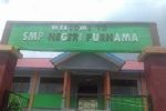 Pureman Kekurangan Guru Foto: Gedung SMP Negeri Purnama Kecamatan Pureman.